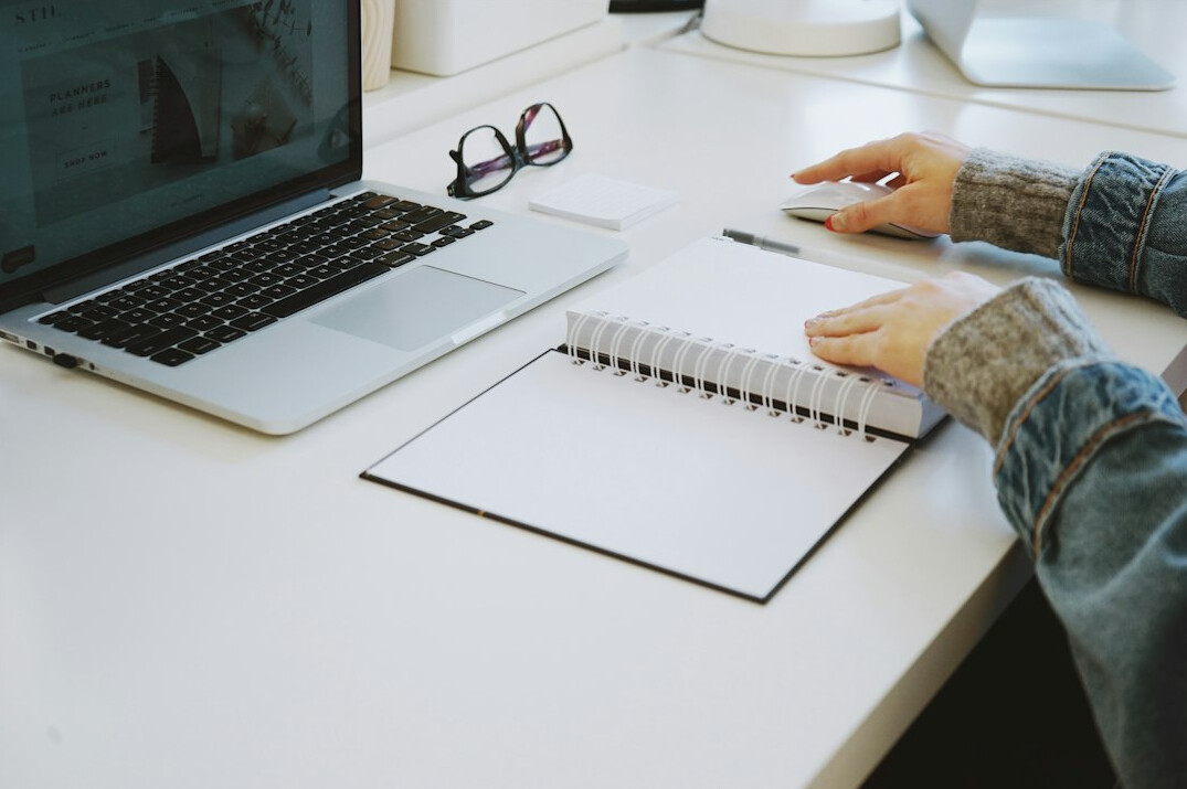 author writing at desk