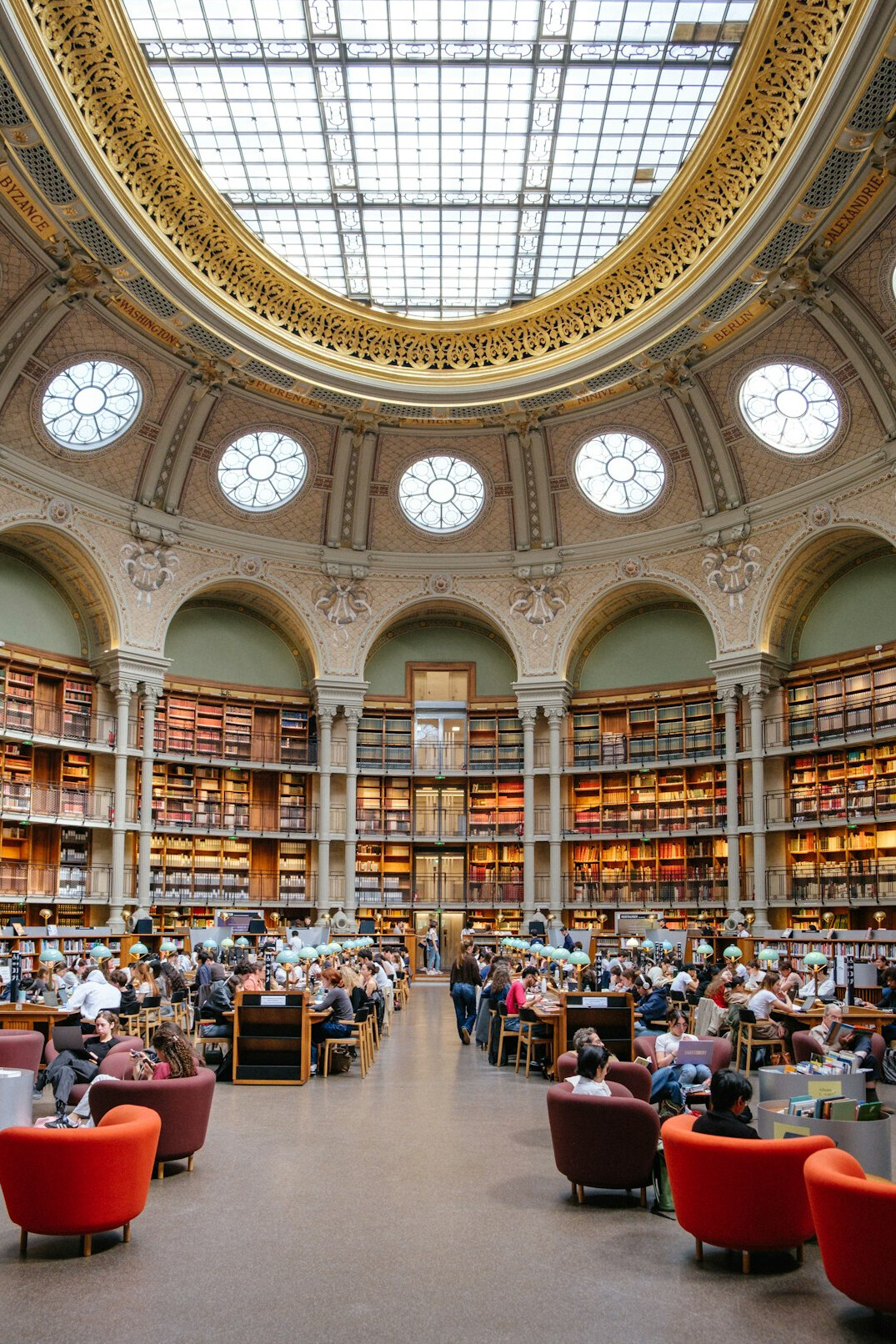 person reading book by window